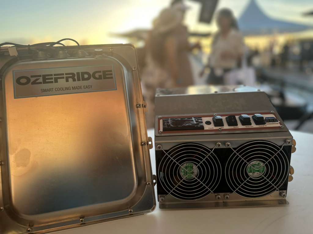 ozefridge portable refrigeration system with a stainless steel cabinet and a control unit